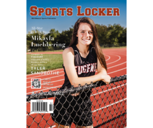 girl in front of track on cover of magazine